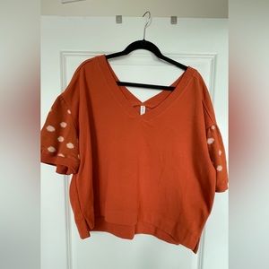 Slightly cropped, double V neck sweatshirt